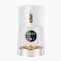 Black and white intelligent pet feeder with smartphone app remote control for automatic feeding