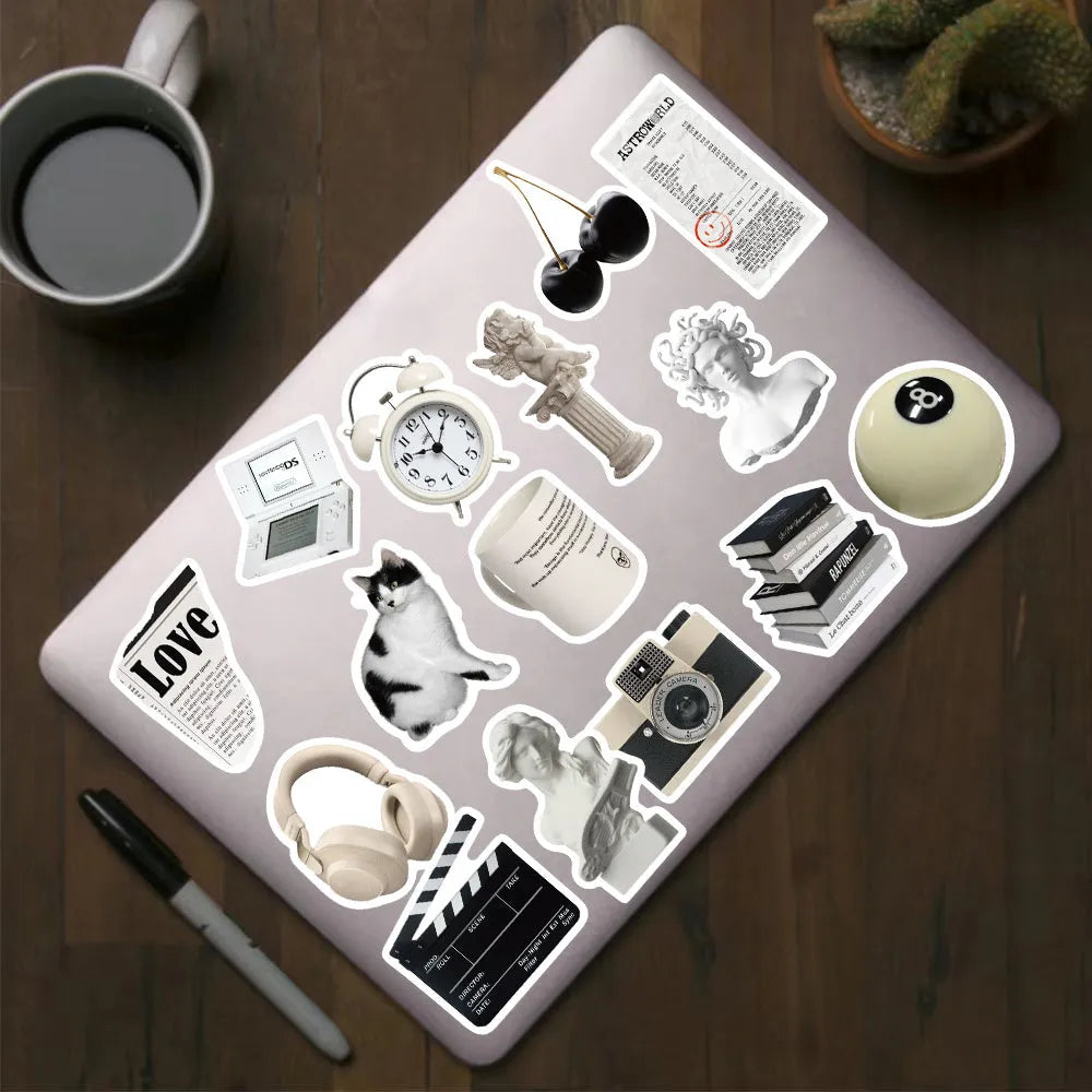 61 black and white PVC waterproof stickers for laptops, phones and multiple surfaces