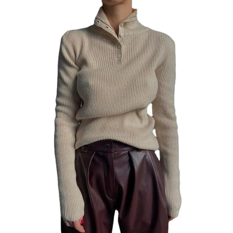 Women's silver grey slim fit pullover sweater with a single-breasted half turtleneck neckline detail.