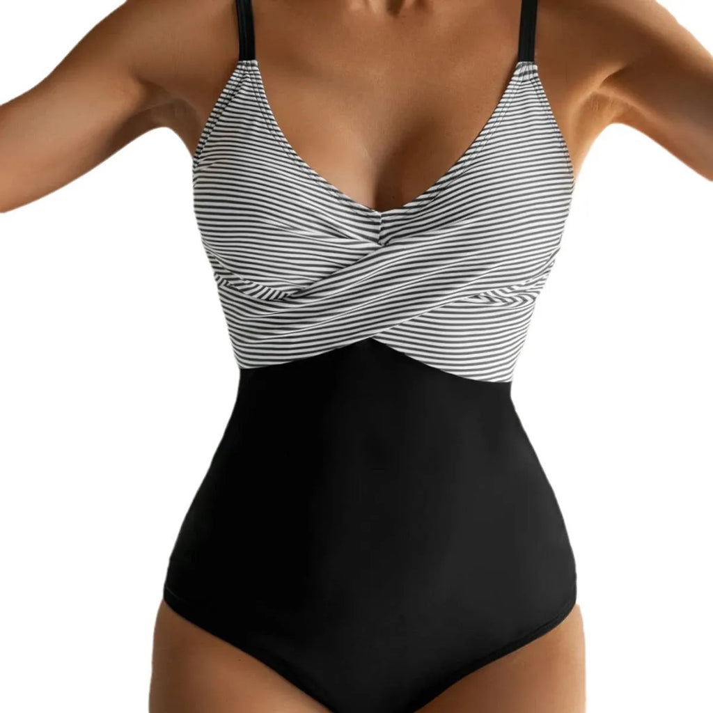 Women's printed one-piece bikini swimsuit with lace-up back in leopard print and floral patterns.