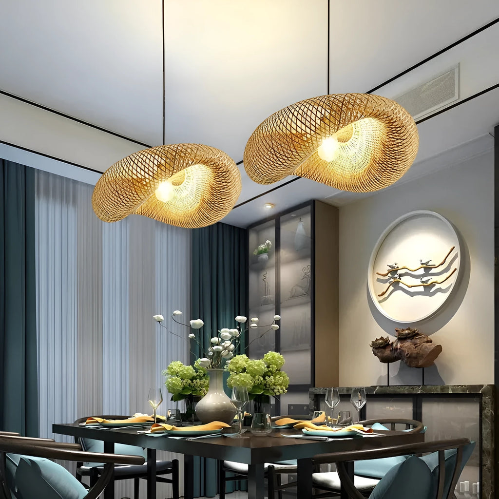 Handmade natural bamboo straw hat-shaped hanging lamp with woven rattan shade.