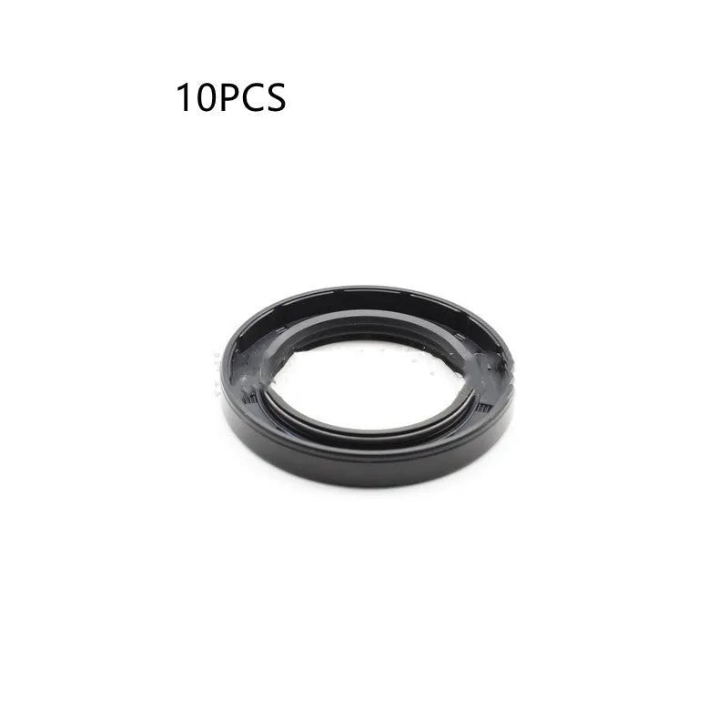Ten black rubber and metal oil seals for AG100 motorcycle engines arranged on a white background.
