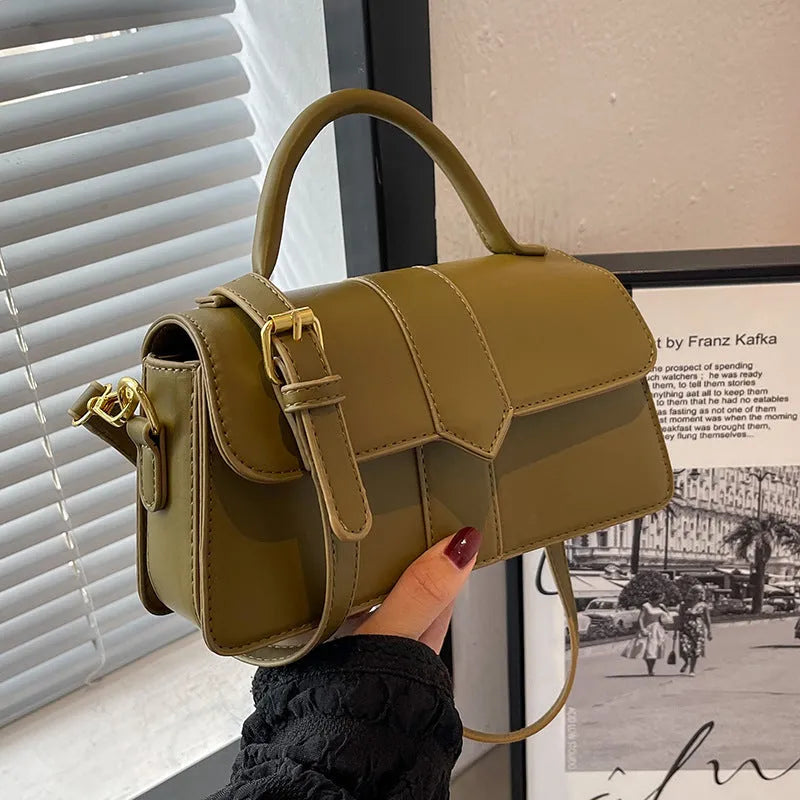 Women's beige messenger bag with horizontal square design showing external pockets and 22cm width