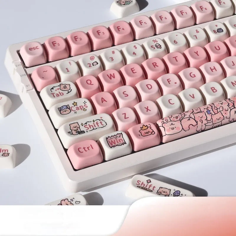 Pink PBT plastic keycap with a cute sublimated pig design on the top and sides.