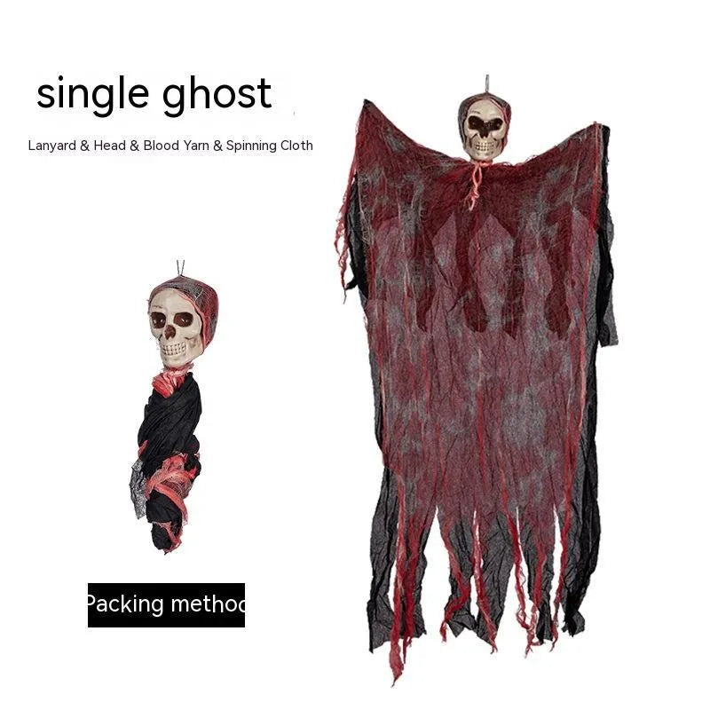 Halloween hanging ghost pendant with dyed blood effect skull decoration on a tree branch