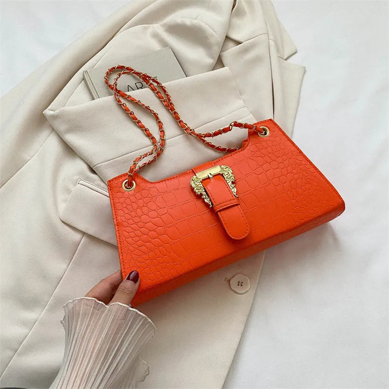 Women's PU horizontal square crossbody bag in orange with single shoulder strap and sandwich pocket