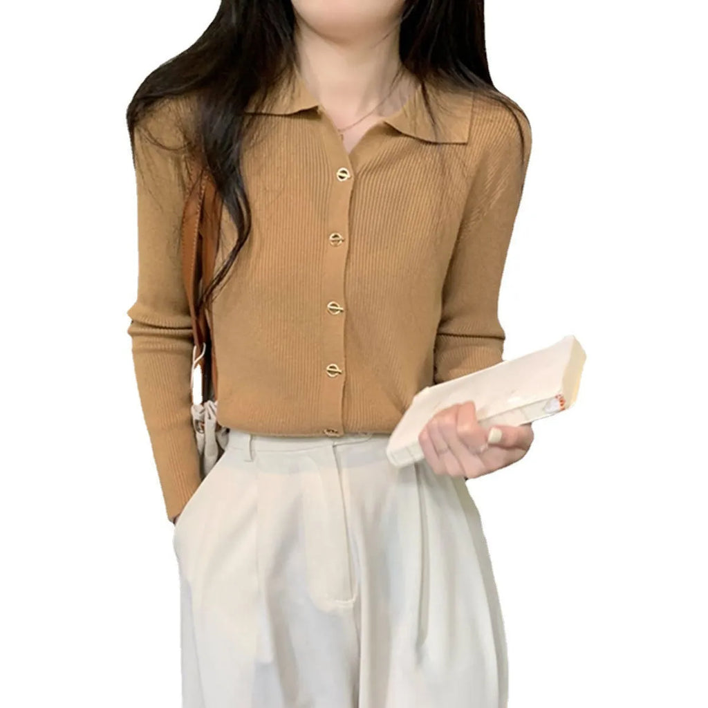 Long-sleeved beige viscose knit cardigan top shown on a hanger, demonstrating its loose fit and regular sleeve length.