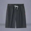 Solid colour cotton-linen cropped pants with a drawstring waist, shown in Army Green.