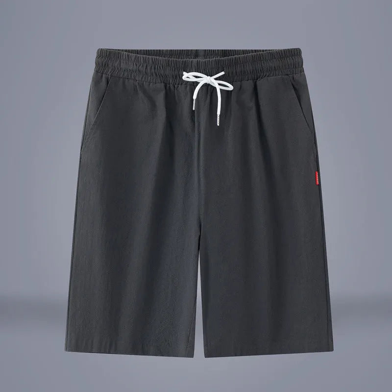 Solid colour cotton-linen cropped pants with a drawstring waist, shown in Army Green.