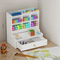 Oblique plastic pen holder storage box with 10 grid compartments and bookshelf on desk