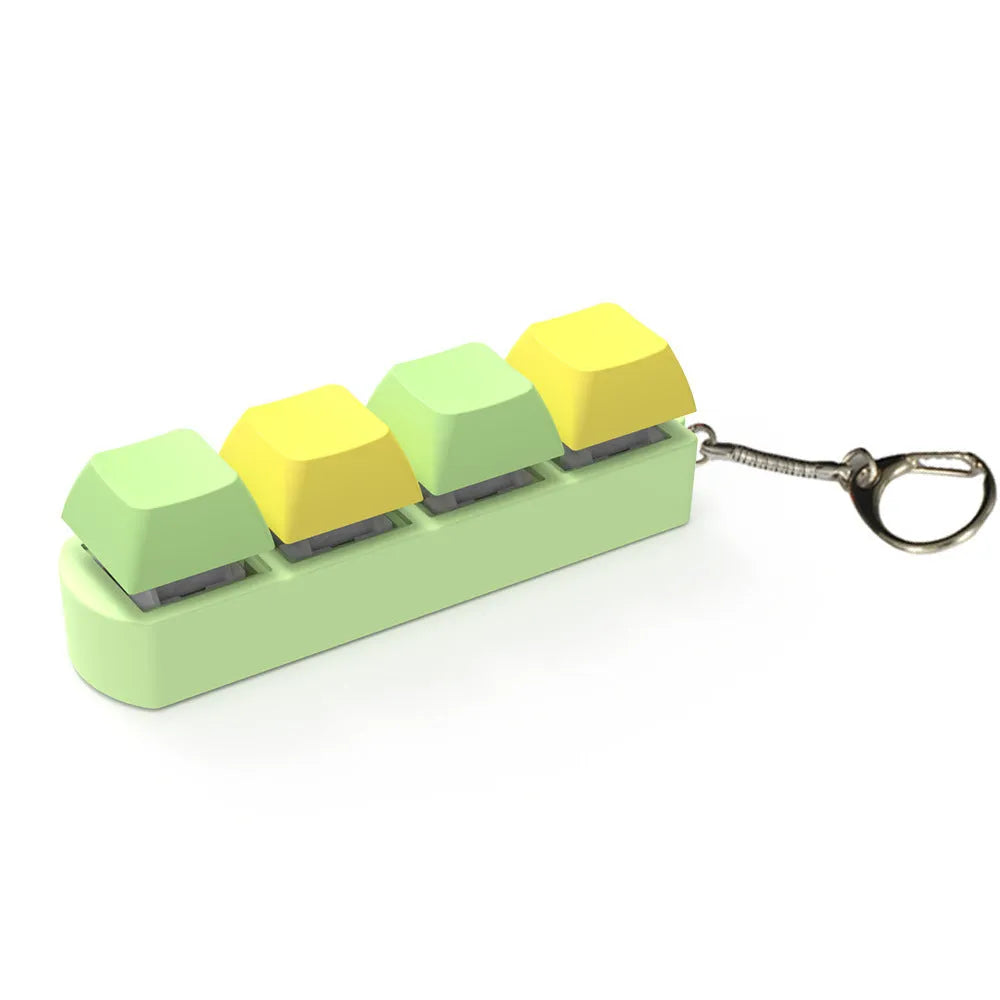 4-key mechanical shaft tester decompression toy with transparent bottom shell and coloured key caps.