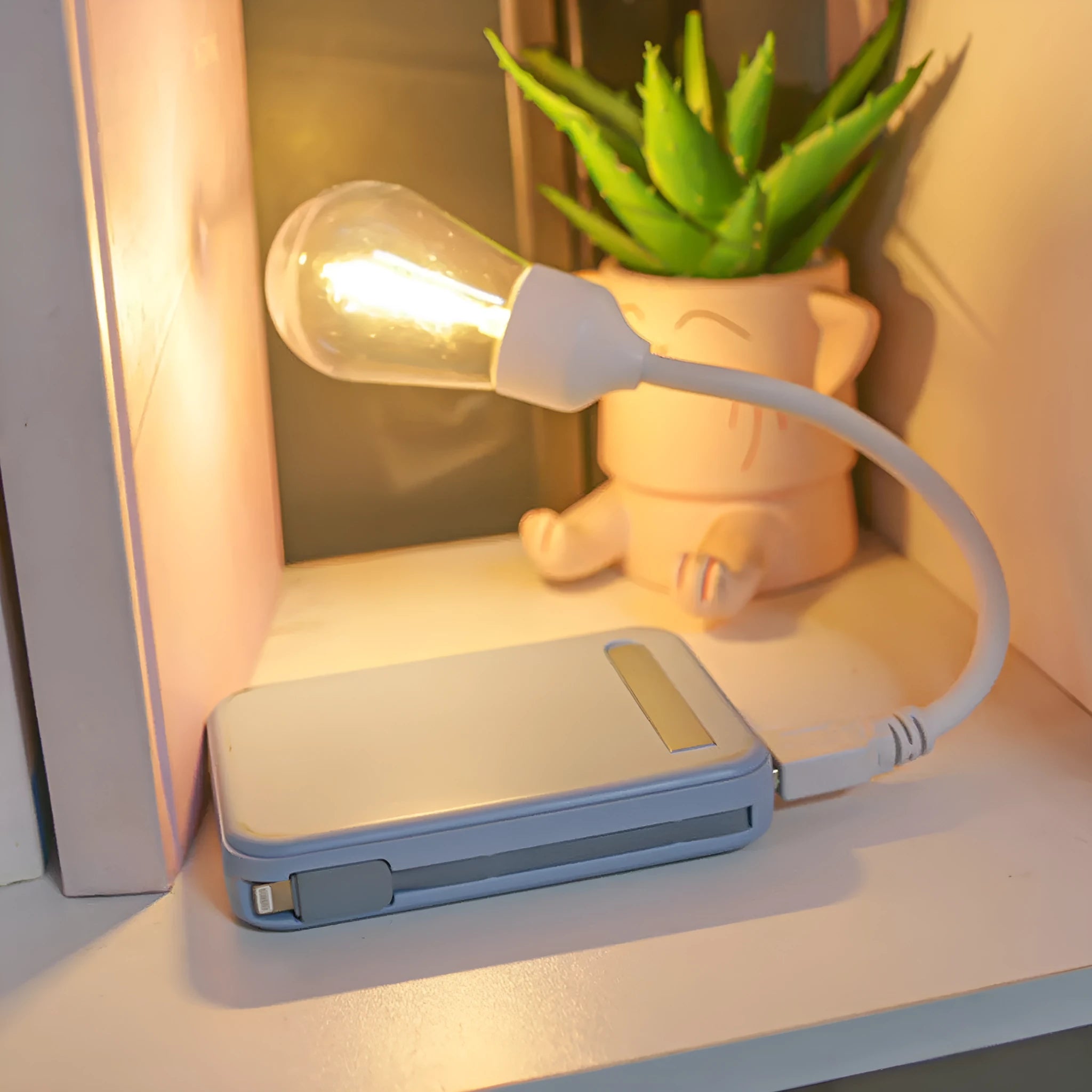 USB rechargeable folding night light with tungsten filament LED bulb in open position