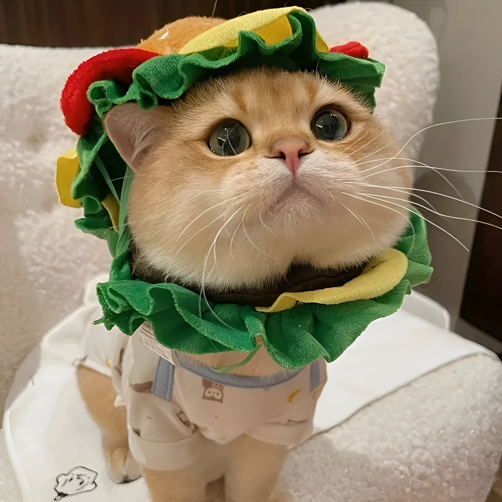 Brown, green, and beige burger-themed fabric headdress for cats on a white background.
