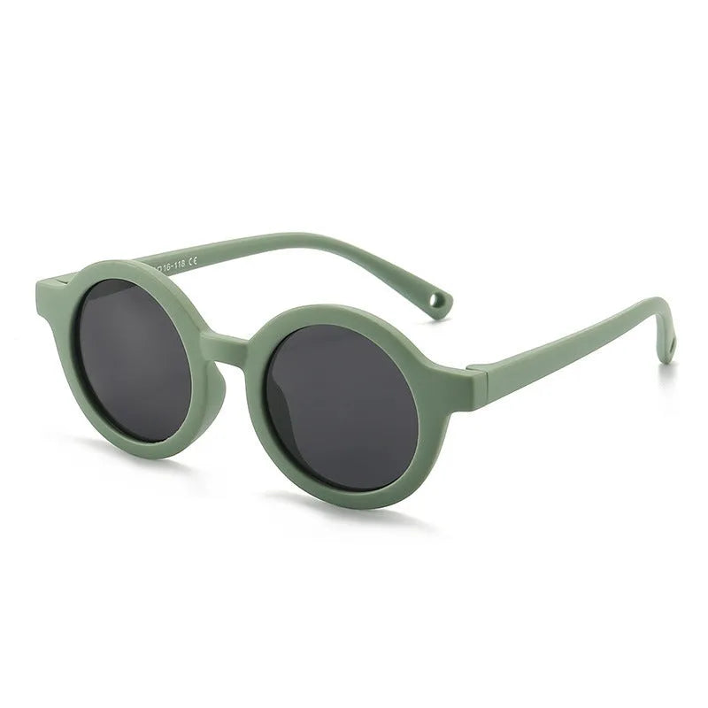 Round frame polarised sunglasses for toddlers aged 0-3 years with UV400 protection, shown in multiple colour options.
