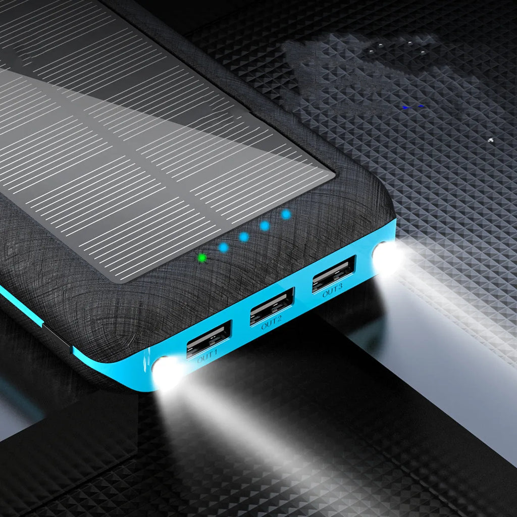 Qi wireless solar power bank with 3 USB outputs and LED flashlight in black plastic shell