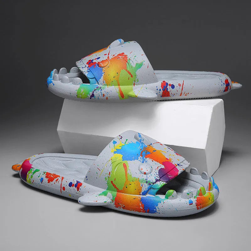 Pair of grey shark-shaped open-toe EVA home slippers on a white background.