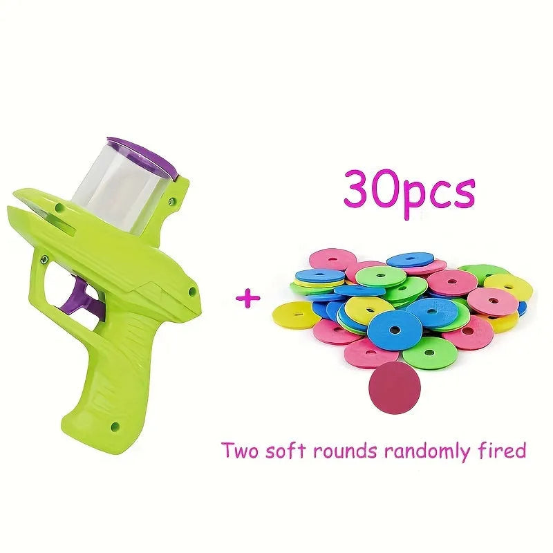 Green or purple battery-free cat toy launcher with foam disc and three foam balls