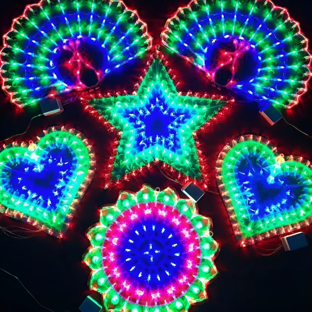 Outdoor Christmas string lights showing peacock, heart, sunflower and star shaped decorative bulbs