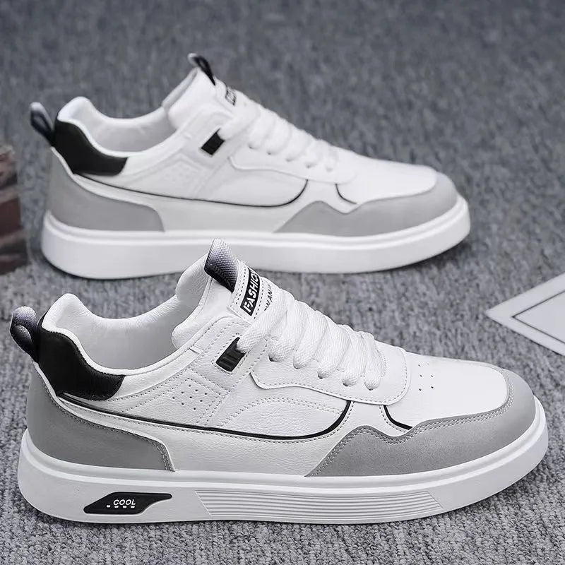 Men's low-top canvas board shoes in solid colours with leather stitching and mesh lining.
