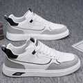 Men's low-top canvas board shoes in solid colours with leather stitching and mesh lining.