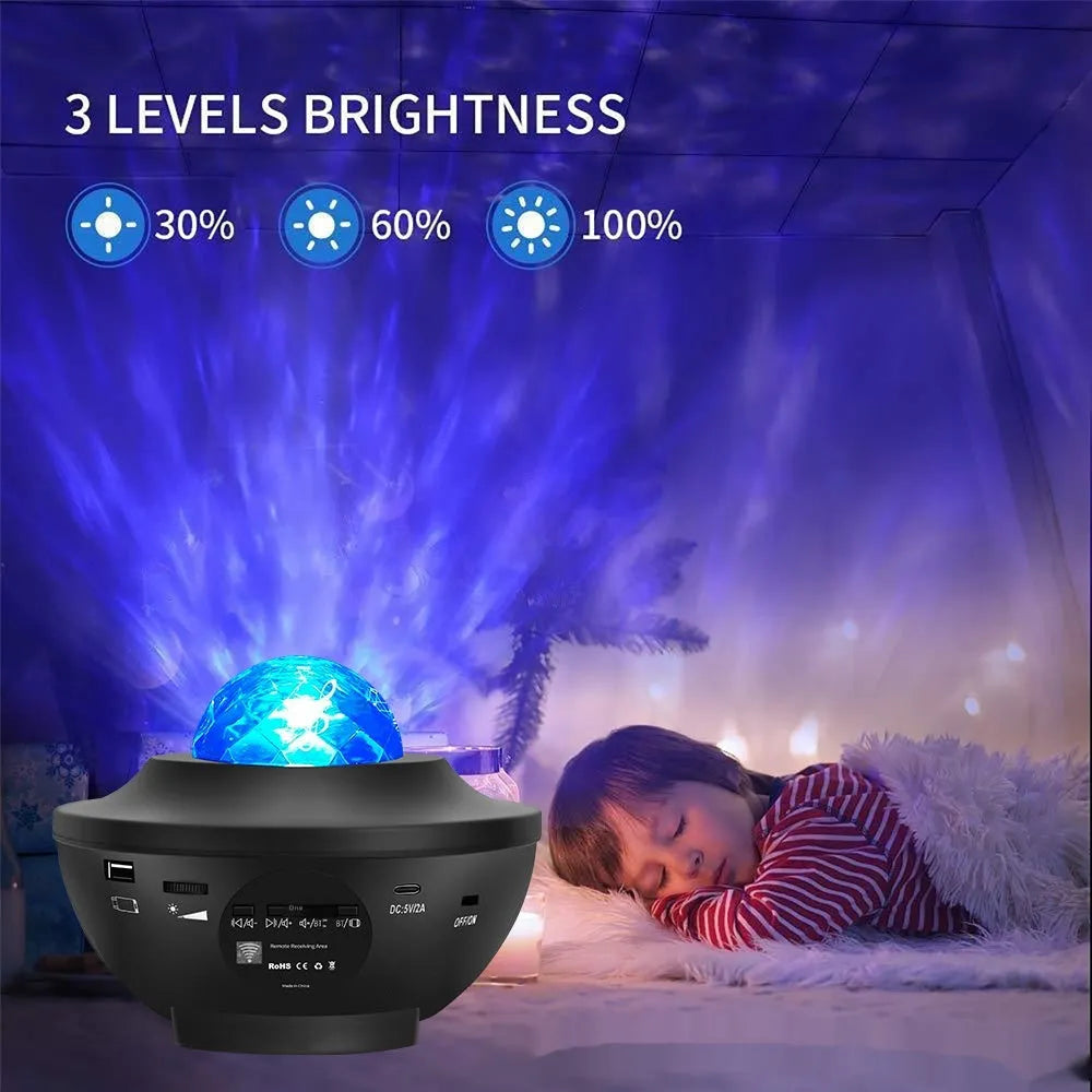 Black USB Bluetooth starry sky projection lamp with rotating water ripple laser effects on desktop