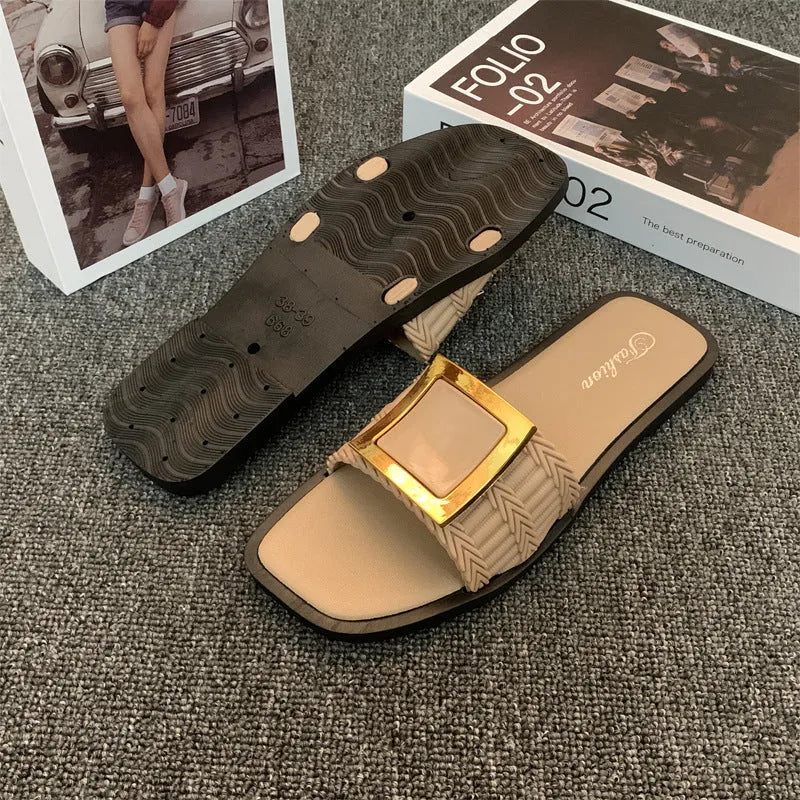 Women's apricot-coloured casual flat slippers with a textured PVC sole.