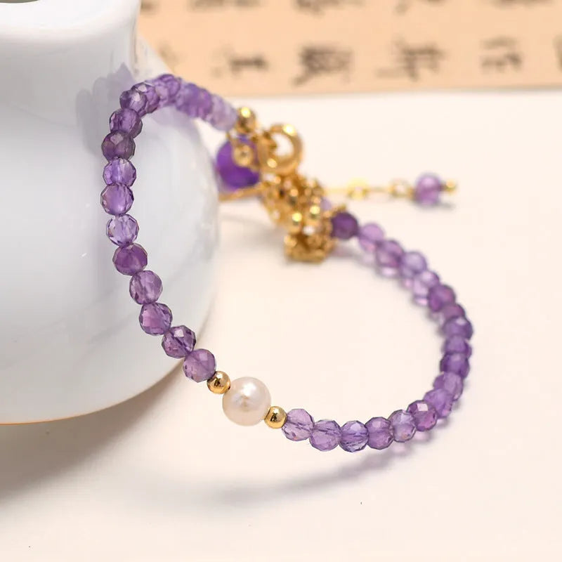 Amethyst Chinese style women's bracelet with diamond-shaped crystal beads and electroplated finish.