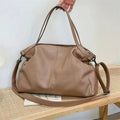 Large soft surface PU messenger tote bag in black with shoulder strap and zipper