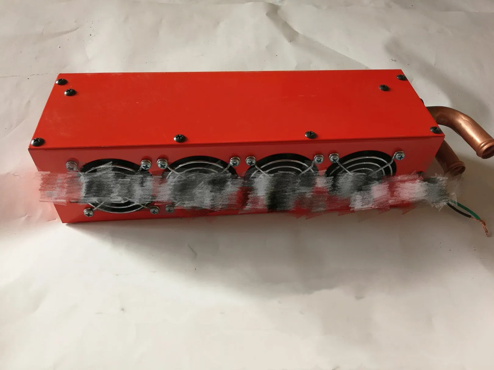 Metal car heater unit with copper pipe connections for engine waste heat utilisation