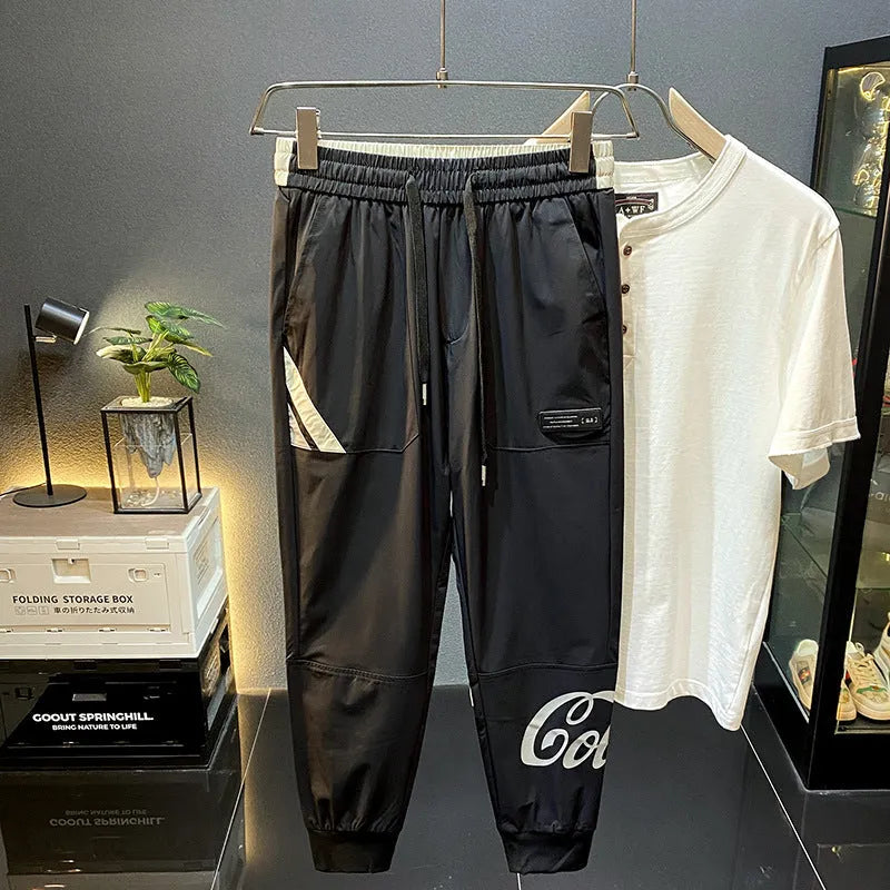 Black men's casual cropped trousers with ankle band made from ultra-thin ice silk and cotton.