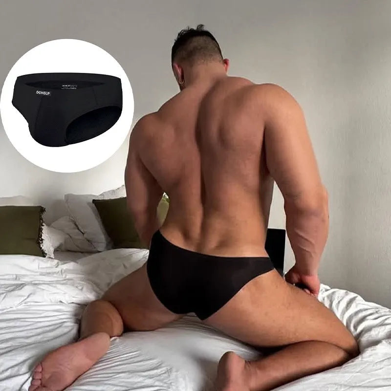 Men's solid colour low-waist seamless briefs in white, black, and pink options