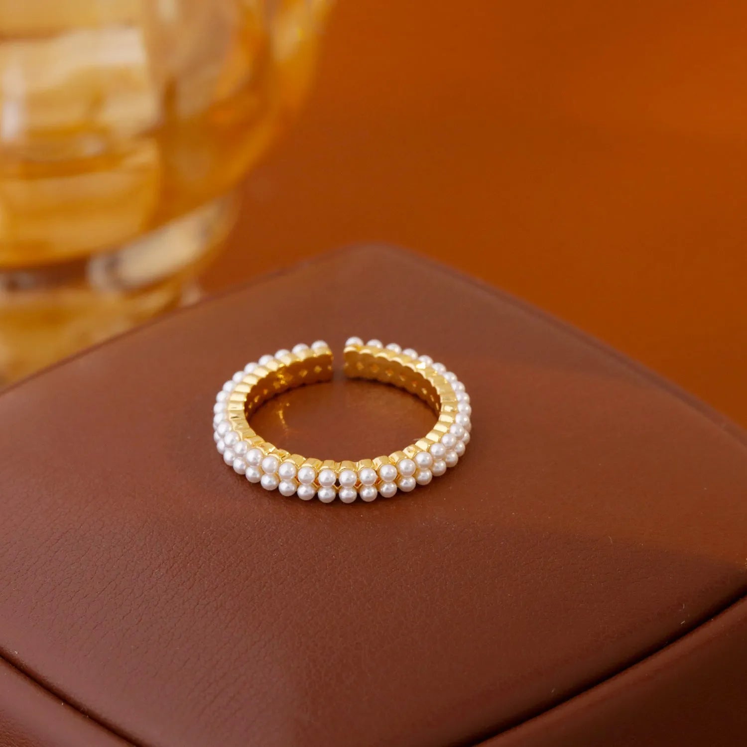 Gold electroplated geometric women's ring with adjustable open mouth design and round elements