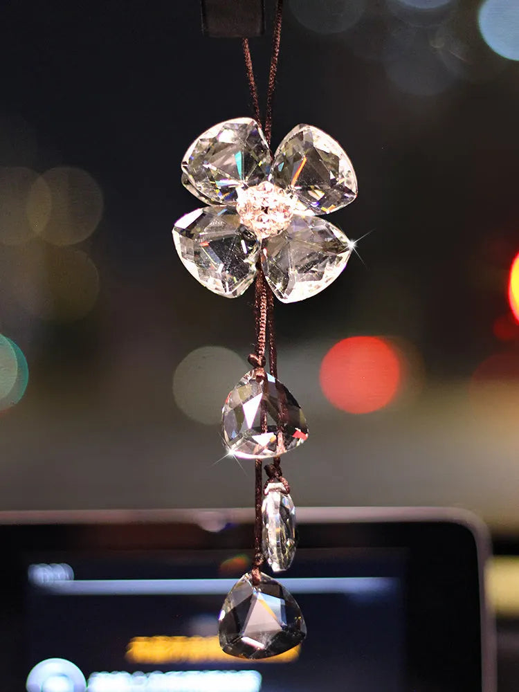 Crystal four leaf grass car pendant measuring around 20cm in transparent, champagne, translucent black finishes