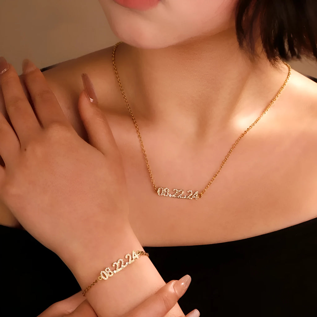 Stainless steel digital bracelet with diamond-set numbers on display, shown in gold tone.