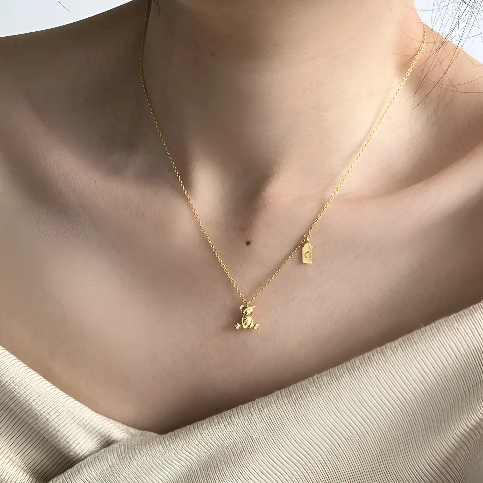 925 silver bear necklace for women with electroplated finish on white background