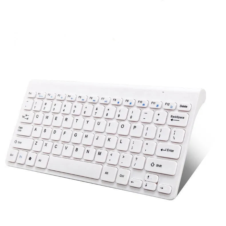 Black and white wireless keyboard and mouse set with UK layout and USB receiver