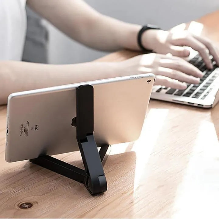 Black foldable tablet holder showing adjustable stand supporting smartphone in landscape orientation