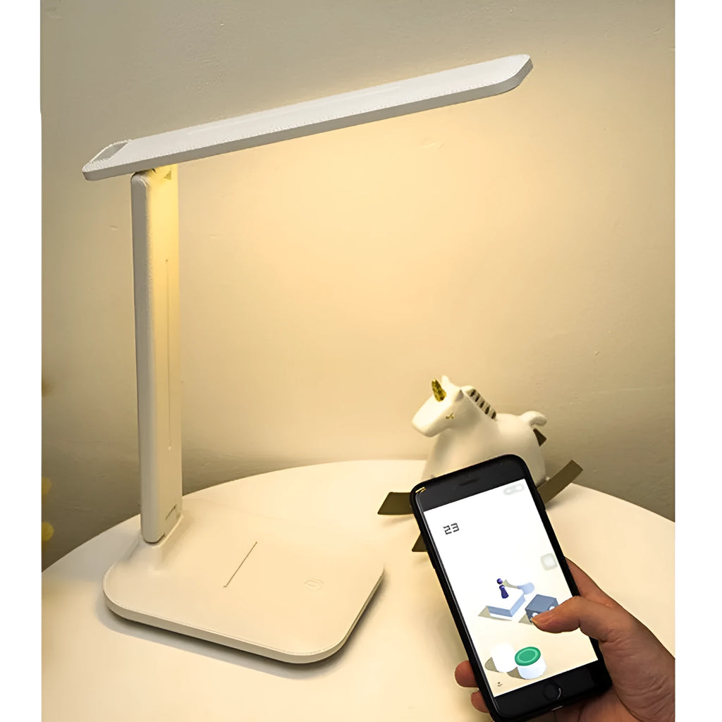 White plastic bedside lamp with touch controls and USB charging port