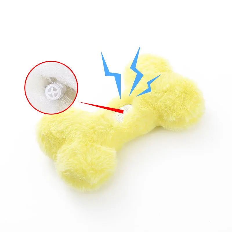 Blue plush bone-shaped dog toy with a squeaker for interactive pet play.