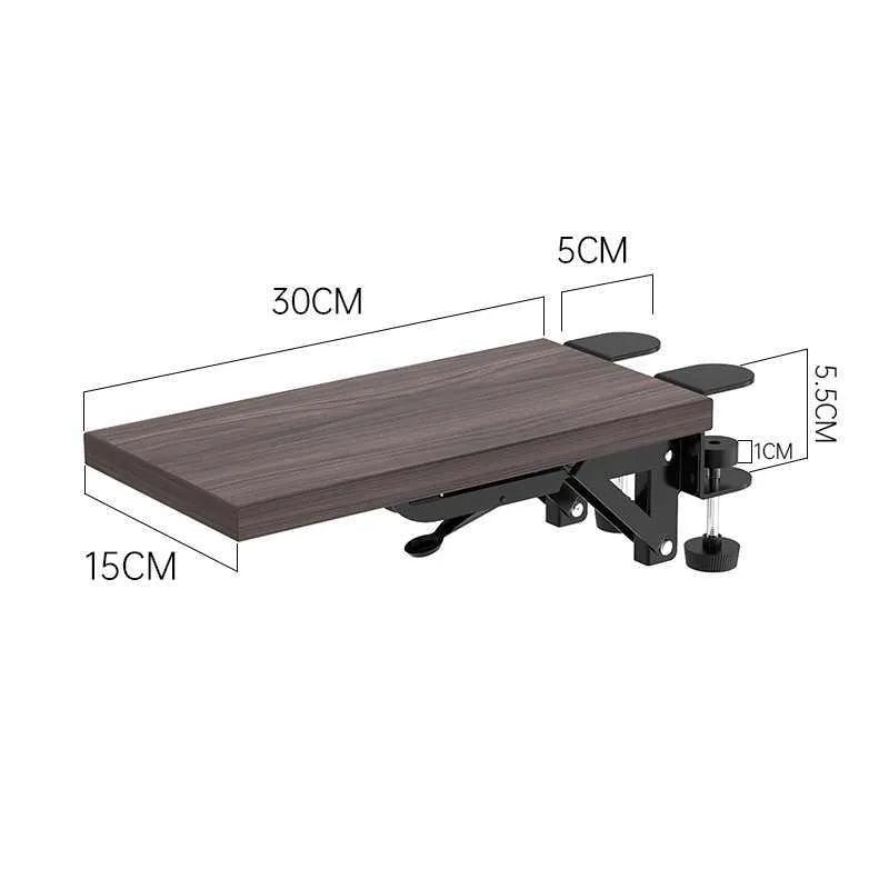 Ergonomic hand bracket in black carbon fiber veneer on a desk for arm support during computer use