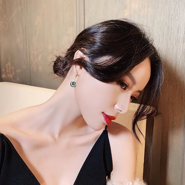 Black alloy geometric round earrings with retro Hong Kong style design measuring 3.6cm
