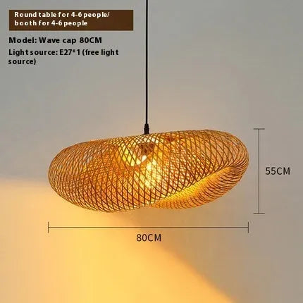 Handmade natural bamboo straw hat-shaped hanging lamp with woven rattan shade.