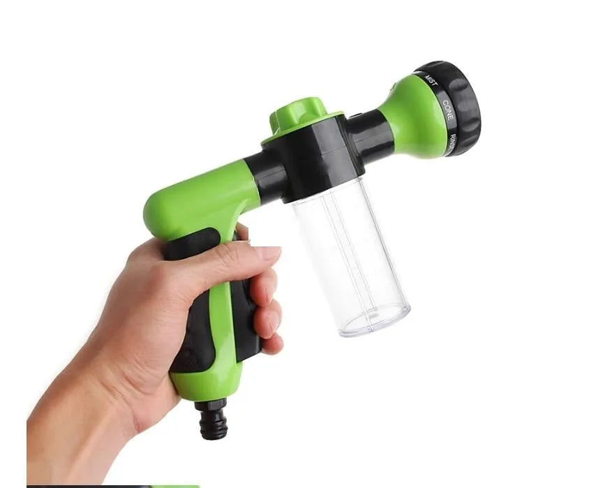 Green high-pressure foam spray gun with adjustable nozzle showing eight spray pattern settings