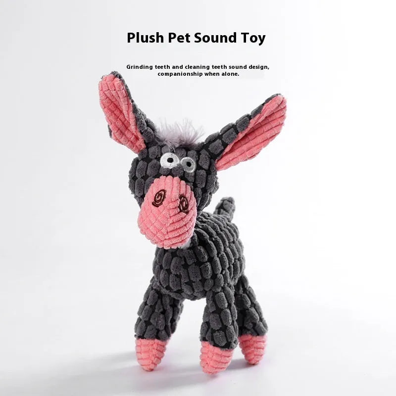 Assorted plush puppy chew toys including a grey donkey, a rechargeable yellow duck, and a blue elephant.