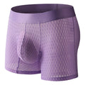 Men's black lace mesh boxer shorts with a low-waist design and geometric pattern.