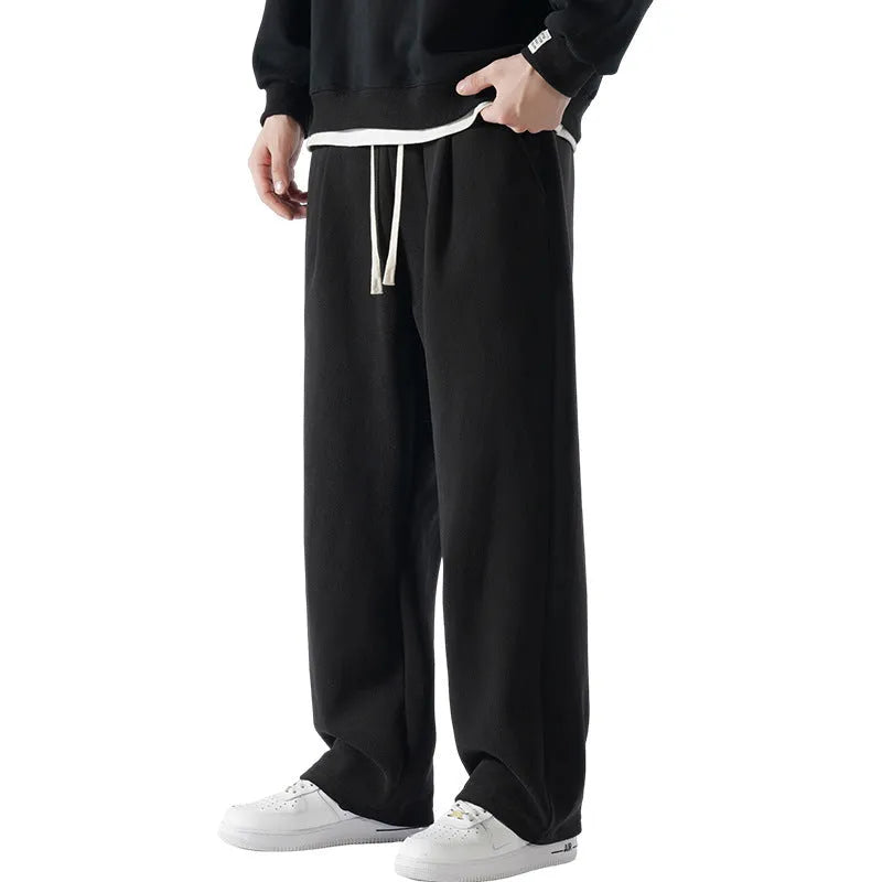 Men's apricot double-sided polar fleece loose-fit winter sports trousers with drawstring waist.