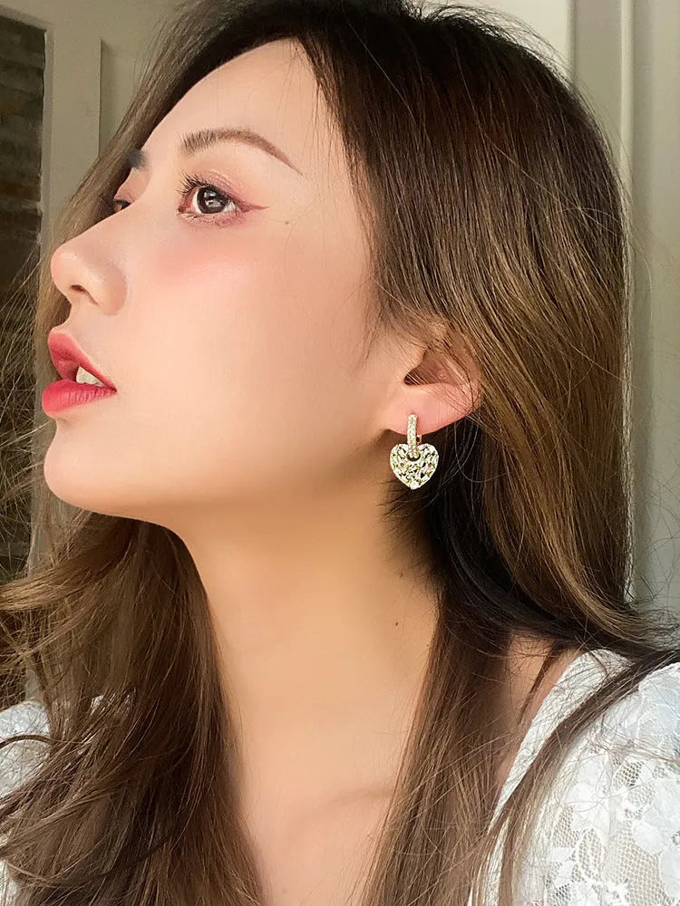 Heart shaped copper earrings with yellow finish and zircon stone for women