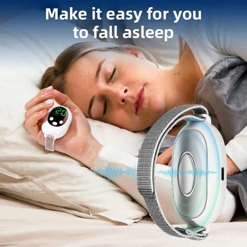 White sleep bracelet insomnia aid device with handheld remote control and USB charging cable
