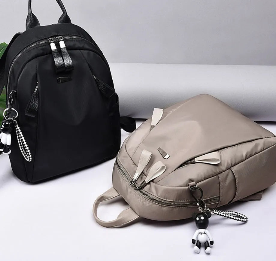 Medium square rucksack in Oxford cloth with phone compartment and double straps