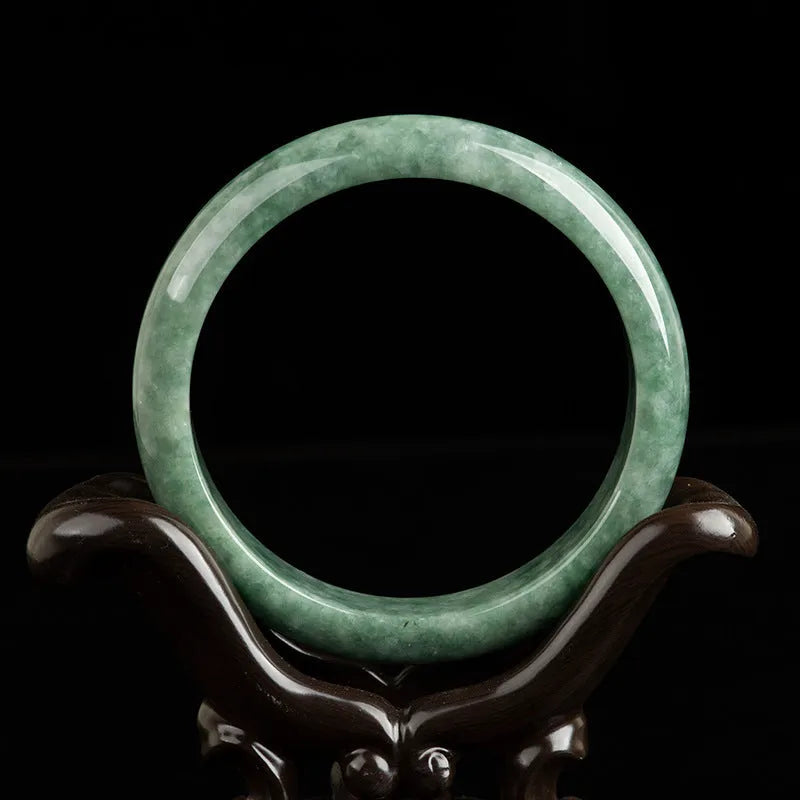 Natural emerald deep pea green jade bracelet simple style on white background with certificate and gift box